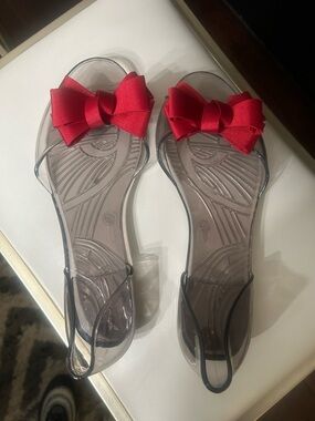Clear Slingback Jelly Sandals with Red Bow Accent - Women